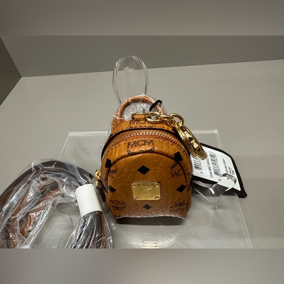 MCM MICRO BACKPACK WITH CROSSBODY STRAP. Can also be used as a bag charm. NWT - Picture 9 of 10